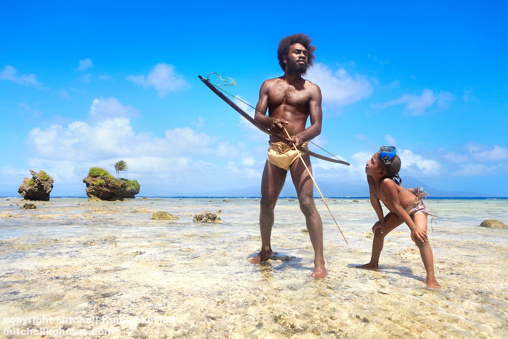 father-and-son-fishing-with-a-bow-and-arrow.jpg