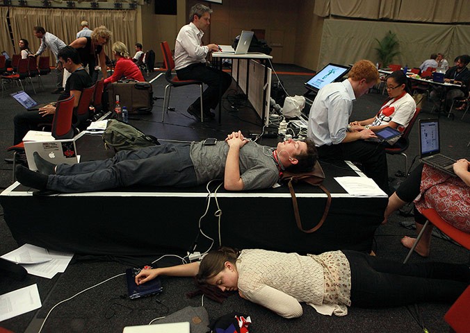 tired-delegates-are-seen-working-till-into-the-early-hours-of-the-morning.jpg